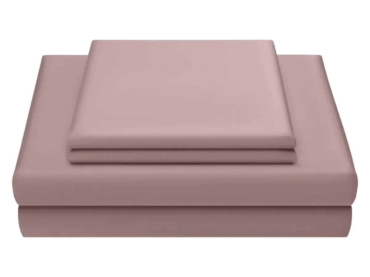 Rosewood Miracle Sheets on a neatly made bed